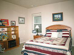 First floor guest bedroom, 5 total in home. 6th bedroom being used as an exercise room, just at the bottom of the stairway.