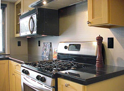 Formica stainless steel wall behind cook stove...