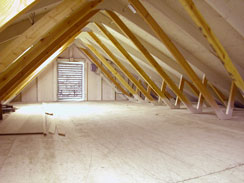 Attic storage over garage, pull-down ladder, light, window, flat floor...