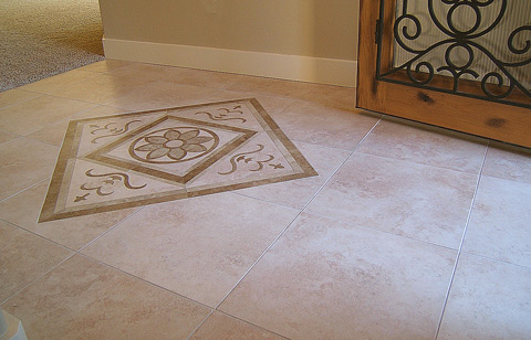 Travertine entry floor, wrought-iron & glass door...