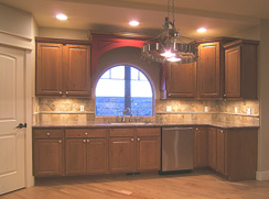 Bosch stainless dishwasher, under counter lights, rustic Cherry wood floor, auto light in pantry...