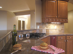 Unique individual drawers close to stove, under cabinet lighting...