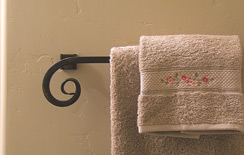 Wrought-iron towel holder, hand textured wall... 